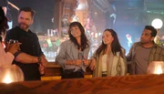 L-R: Frank Shaw (Joel McHale), Victoria Sands (Grace Palmer), Melinda (Eve Palmer), and Amit Patel (Ravi Patel)