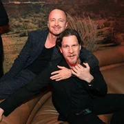 HOLLYWOOD, CALIFORNIA - APRIL 09: (L-R) Aaron Paul and Jonathan Nolan attend the Fallout Global Red Carpet Premiere at TCL Chinese Theatre in Hollywood, California. (Photo by Anna Webber/Getty Images for Prime Video)