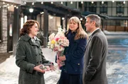 Melanie Lynskey (Julie Bingham), Amy Morton (Kara Bingham), George Clooney (Ryan Bingham).