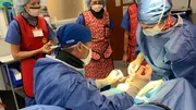 Dr. Brad and Dr. Sarah in the Operating Room working on Dana Carl’s foot.