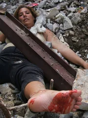 Re-enactment: Mariza Ramos, a customer in the Humberto Vidal shoe store, is killed by the force of the explosion