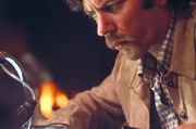 John Baxter (Donald Sutherland)