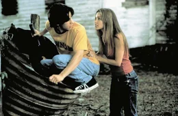 L-R: Darry Jenner (Justin Long), Patricia "Trish" Jenner (Gina Philips)