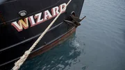 High angle shot of diver going under the Wizard.