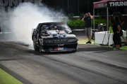 Mike Murillo and his precision Turbo Mustang perform a burnout.