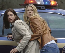L-R: Kimberly Corman (A.J. Cook) and Clear Rivers (Ali Larter)