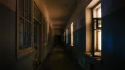 Dark creepy corridor of abandoned hospital at night. Horror concept. Dark creepy corridor of abandoned hospital at night. Horror concept.