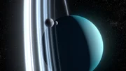 Uranus, der siebte Planet, umkreist die Sonne auf einer stark geneigten Achse. Seine Ringe und Monde bewegen sich im Verhältnis zur Sonne und den anderen Planeten senkrecht um den Eisriesen. Uranus, der siebte Planet, umkreist die Sonne auf einer stark geneigten Achse. Seine Ringe und Monde bewegen sich im Verhältnis zur Sonne und den anderen Planeten senkrecht um den Eisriesen.