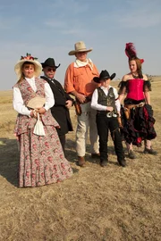 Dressed in full period garb, Pastor Nitro and the Pistoleros stand ready to show our experts how a quick draw competition was done in the Old Wes Dressed in full period garb, Pastor Nitro and the Pistoleros stand ready to show our experts how a quick draw competition was done in the Old Wes