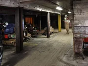 Jay walking through a section of the mill looking for items to reclaim. Jay walking through a section of the mill looking for items to reclaim.