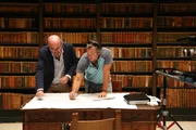 Darrell Miklos and Manuel Rodriguez go over ancient documents in a library in Jevez, Spain. Darrell Miklos and Manuel Rodriguez go over ancient documents in a library in Jevez, Spain.