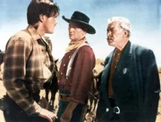 v.li.: Martin Pawley (Jeffrey Hunter), Ethan Edwards (John Wayne), Rev. Capt. Samuel Johnston Clayton (Ward Bond)