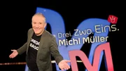 Key Visual Sendereihenbild mit Typo zu "Drei. Zwo. Eins. Michl M&uuml;ller". Pointiert und s&uuml;ffisant kommentiert der selbsternannte "Dreggsagg" in seiner satirischen Chart-Show "Drei. Zwo. Eins. Michl M&uuml;ller" die aktuelle Nachrichtenwelt aus Politik, Boulevard und Gesellschaft.