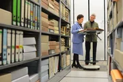 Sam Willis is examining the archives with Dr. Andrea Hohmeyer, Head of Corporate Archives, Evonik Industries AG in Germany. Between 1940 and 1944 Degussa processed 420 tons of silver and 5 tons of gold. Nearly half of the gold was stolen from Jews.