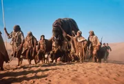 Villagers driving the crew to their home