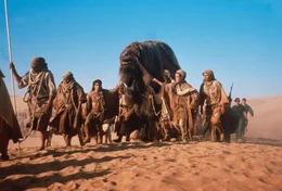 Villagers driving the crew to their home