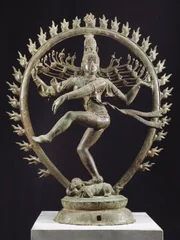 Shiva as Nataraja dancing in a circle of flames, bronze statue in Dravidian style, India. Detail.