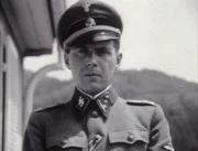 Der SS-Lagerarzt Josef Mengele führt in Auschwitz Experimente an Häftlingen durch. Der SS-Lagerarzt Josef Mengele führt in Auschwitz Experimente an Häftlingen durch.