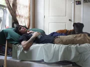 New Orleans, Louisiana USA: Billy, a user, at home in his bed. New Orleans, Louisiana USA: Billy, a user, at home in his bed.