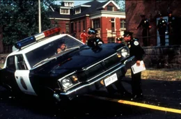 Bubba Smith (m), G.W. Bailey (r).