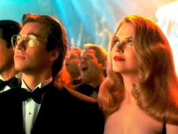 L-R: Bruce Wayne (Val Kilmer) und Dr. Chase Meridian (Nicole Kidman)