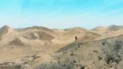 Peru - Albert Lin explores vast sand dunes in the desert of Northern Peru.
