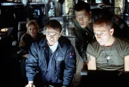 L-R: Lt. Starck (Joely Richardson), Dr. William Weir (Sam Neill), Captain Miller (Laurence Fishburne), Smith (Sean Pertwee)