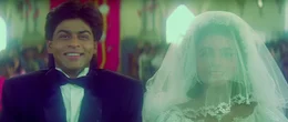 Sunil (Shah Rukh Khan, l.) und Anna (Suchitra Krishnamoorthi, r.)  +++ Die Verwendung des sendungsbezogenen Materials ist nur mit dem Hinweis und Verlinkung auf RTL+ gestattet. +++