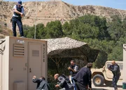 The NCIS team searches for a suspect and their motive following the bombing of a large facility where military combat drones are assembled. Also, Callen and Kilbride get troubling news about a body found in Syria. Pictured (L-R): Eric Christian Olsen (LAPD Liaison Marty Deeks), Chris O'Donnell (Special Agent G. Callen) and LL COOL J (Special Agent Sam Hanna).