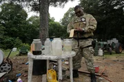 MISS.- Michael Mosley from the Mississippi ABC on a moonshine raid. MISS.- Michael Mosley from the Mississippi ABC on a moonshine raid.