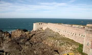 ALDERNEY, CHANNEL ISLANDS - Landscape of 3-level bunker at the northern point of Strongpoint Josefsburg, with northern Victorian wall extending to the foreground. (photo credit: DSP) ALDERNEY, CHANNEL ISLANDS - Landscape of 3-level bunker at the northern point of Strongpoint Josefsburg, with northern Victorian wall extending to the foreground. (photo credit: DSP)