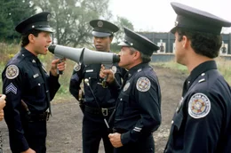 In the back from left to right:  Sgt. Carey Mahoney (Steve Guttenberg),  Sgt. Laverne Hooks (Marion Ramsey), Capt. Thaddeus Harris (G.W. Bailey)