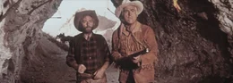 Die beiden mutigen Freunde Old Wabble (Paddy Fox, l.) und Old Surehand (Stewart Granger, r.) wagen sich in die H&ouml;hle des L&ouml;wen ...