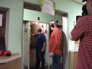 Tom Ross (Armourer) and Alex Cranmer test fire a confederate revolver at a test range.