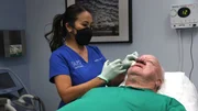Dr. Sandra Lee numbs John S. nose in preperation for surgery.