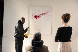 L-R: Driss (Omar Sy), Philippe (Francois Cluzet), Galeristin (Emilie Caen).