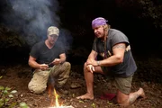 Joe Teti and Cody Lundin at camp starting a fire with 2-half pieces of bamboo, Maui, Hawaii.