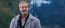 Stanley Tucci (George Harvey).