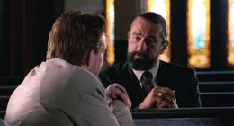 L-R: Harry Angel (Mickey Rourke), Louis Cyphre (Robert De Niro)