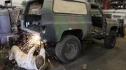 Michael Manousakis working on truck. Michael Manousakis working on truck.