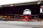 A plane arrives at International Cargo Facility. A plane arrives at International Cargo Facility.
