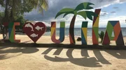 The "i love Utila" sign on Chepes Beach, in Utila, Honduras. As seen on HGTV's Caribben Life