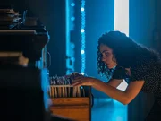 Elaine (Brittany O'Gray)