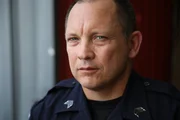 A portrait of Detective Ronald Flag.