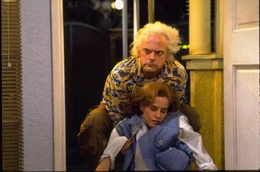 Back to front: Doc Brown (Christopher Lloyd, r.), Marty (Michael J. Fox)