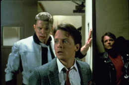 L-R: Tannen (Thomas F. Wilson), Marty McFly (Michael J. Fox), Marty McFly (Michael J. Fox)
