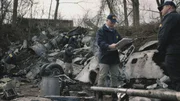 REENACTMENT - The Lead NTSB Investigator (played by Brendan Wall) reviews crucial documents at the crash site of Execuflight 1526. (Cineflix/James Griffith)