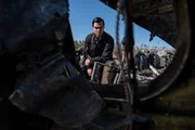 REENACTMENT - The Main Investigator (played by RJ Parrish) surveys the wreckage site of US-Bangla Airlines Flight 211 to determine what might have caused the aircraft to crash. (Cineflix/Darren Goldstein) REENACTMENT - The Main Investigator (played by RJ Parrish) surveys the wreckage site of US-Bangla Airlines Flight 211 to determine what might have caused the aircraft to crash. (Cineflix/Darren Goldstein)