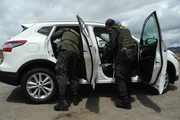 BOGOTA, COLOMBIA- National Colombian Police checking a car.