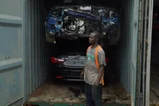 GHANA- A Tema port worker has just opened a suspicious container for a check-up.